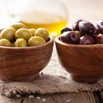 black and green marinated olives in bowl